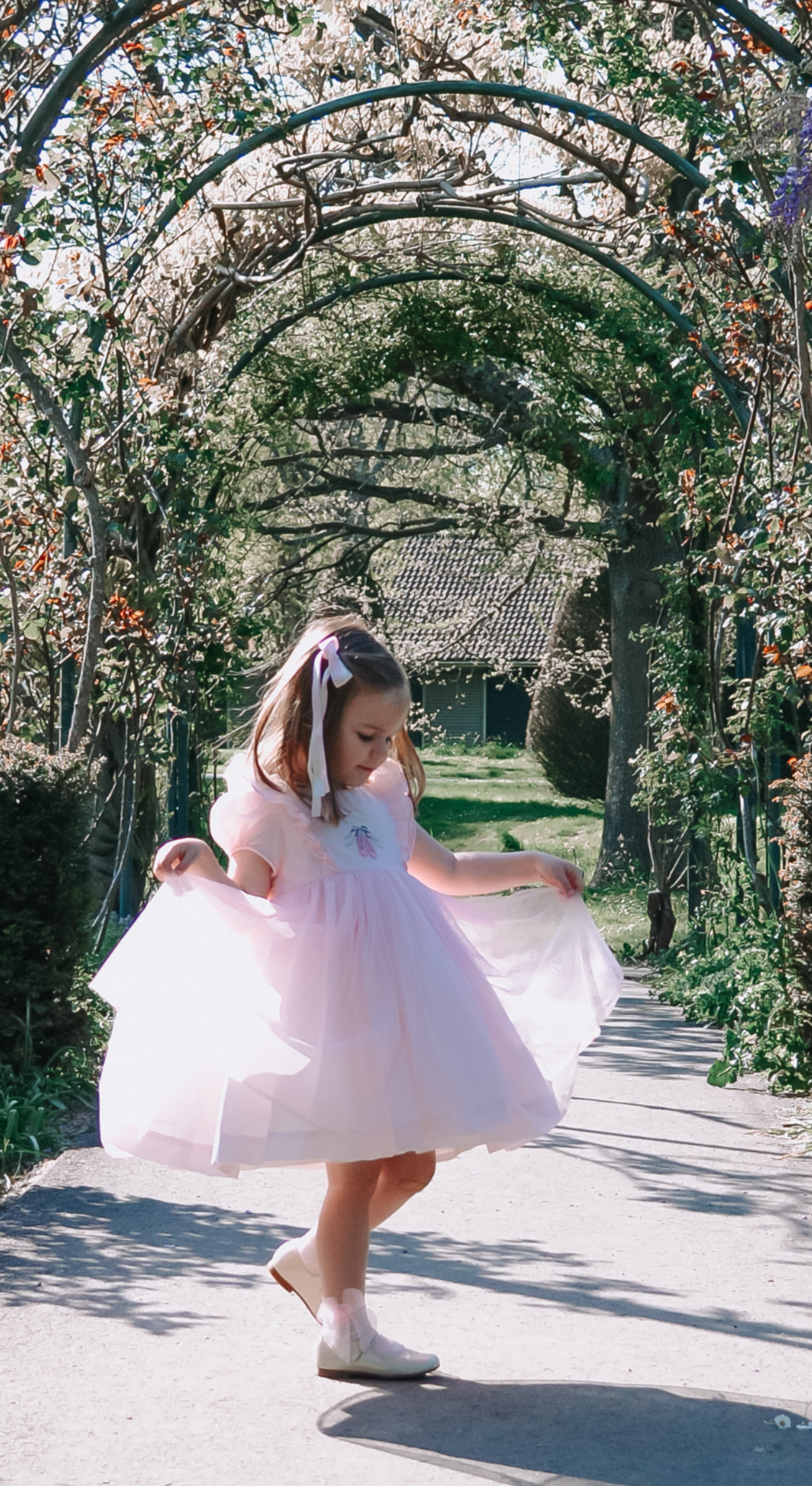 Charlotte sy Dimby classic timeless traditional smocked dresses for babies and girls handmade French style children clothing paris boutique twirling princess dress japan tokyo pastel blue