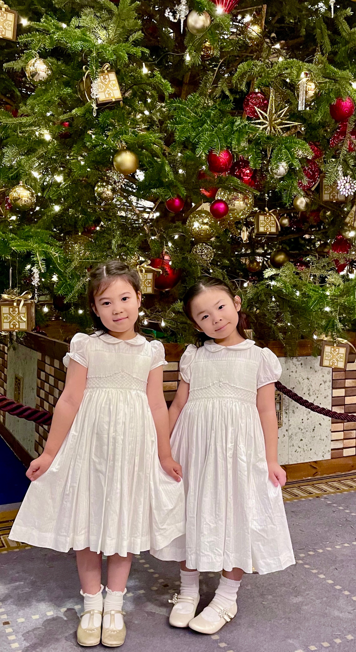 Charlotte sy Dimby classic timeless traditional smocked dresses for babies and girls handmade French style children clothing paris boutique soft pink striped dress singapour