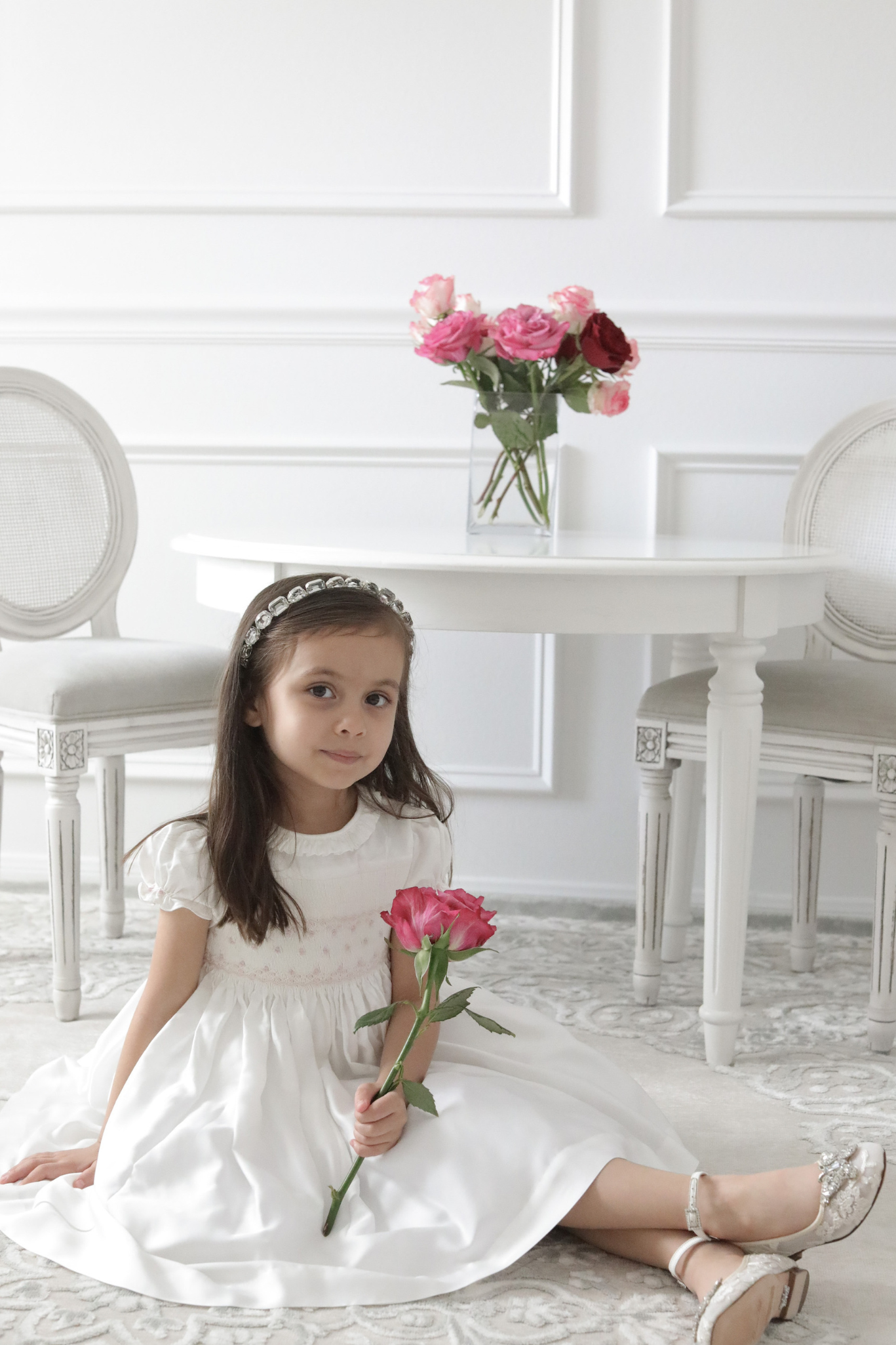 Charlotte sy Dimby classic timeless traditional smocked dresses for babies and girls handmade French style children clothing paris boutique twirling princess dress white heirloom elegant portrait dress houston texas