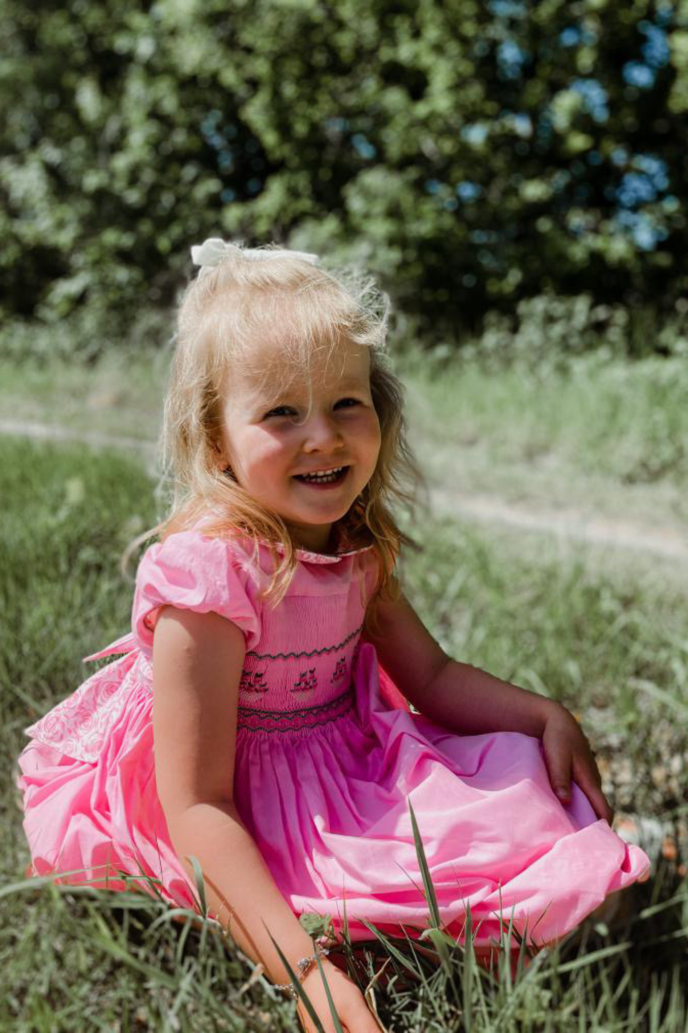 Charlotte sy Dimby classic timeless traditional smocked dresses for babies and girls handmade French style children clothing paris boutique bright pink high quality netherlands