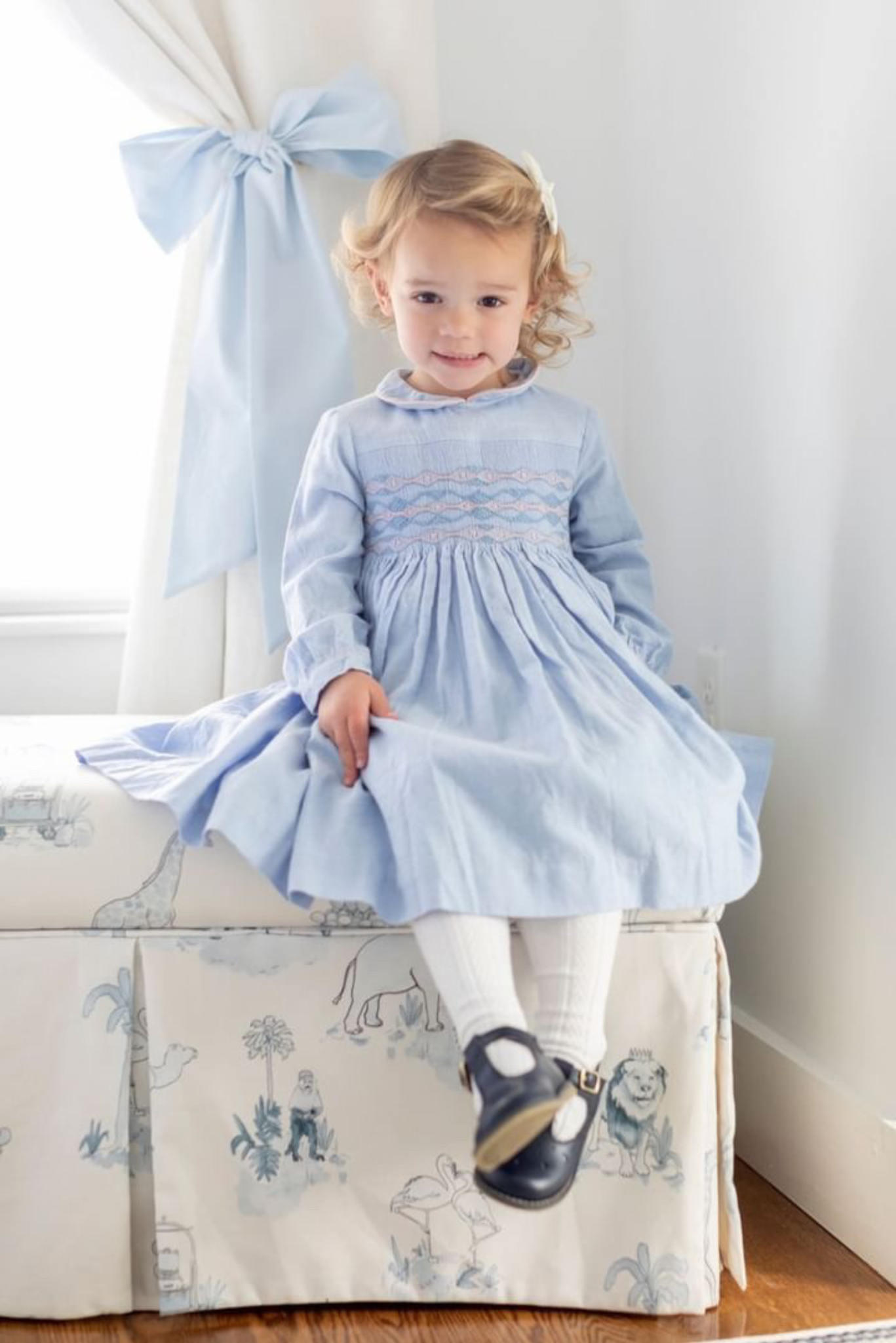 Charlotte sy Dimby classic timeless traditional smocked dresses for babies and girls handmade French style children clothing paris boutique pastel blue peter pan collar dress heirloom portrait massachusetts