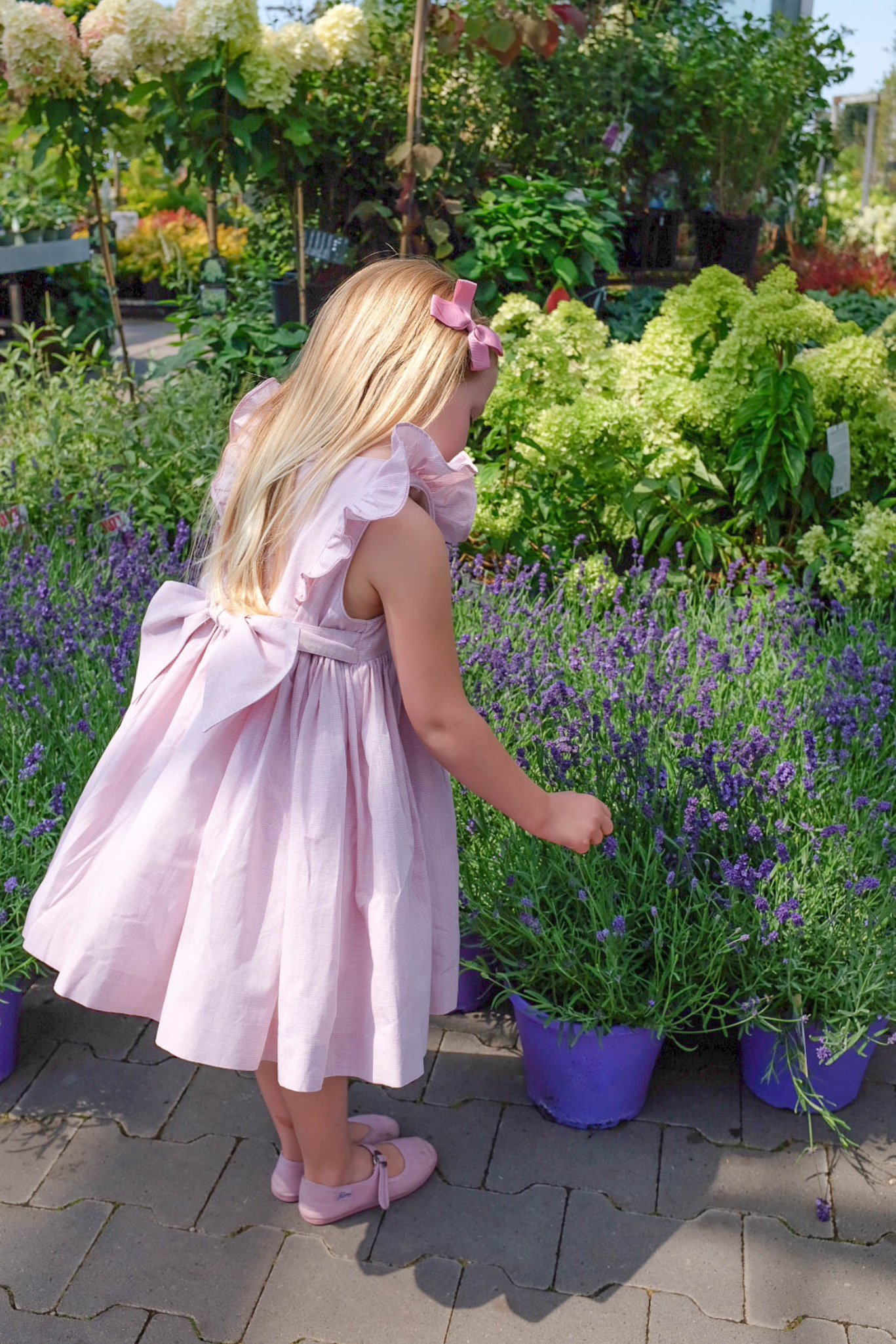 Charlotte sy Dimby classic timeless traditional smocked dresses for babies and girls handmade French style children clothing paris boutique twirling princess dress white heirloom elegant portrait dress soft pink ruffles netherlands