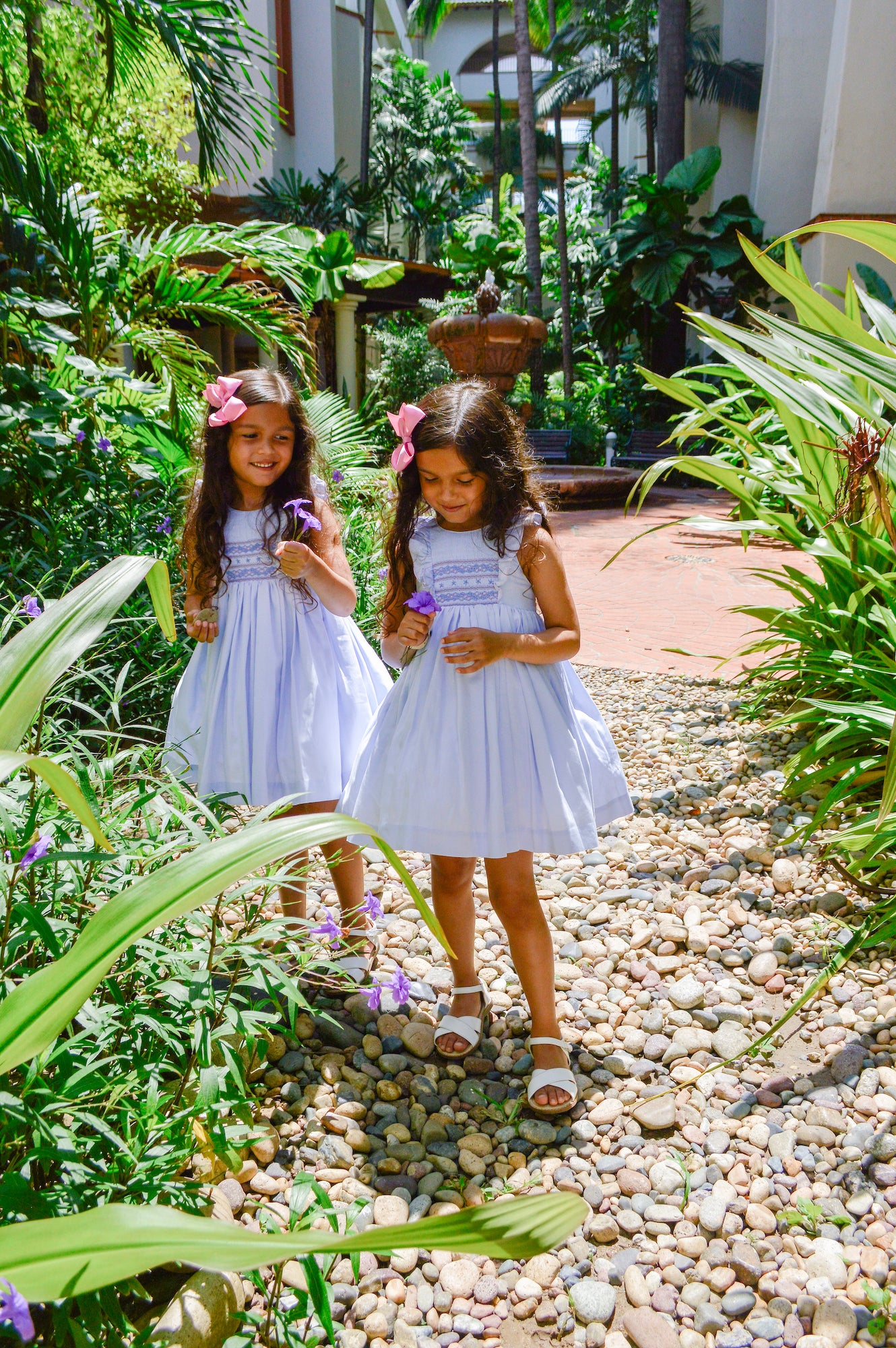 Charlotte sy Dimby classic timeless traditional smocked dresses for babies and girls handmade French style children clothing paris boutique light blue ruffle summer dress matching sisters twins illinois