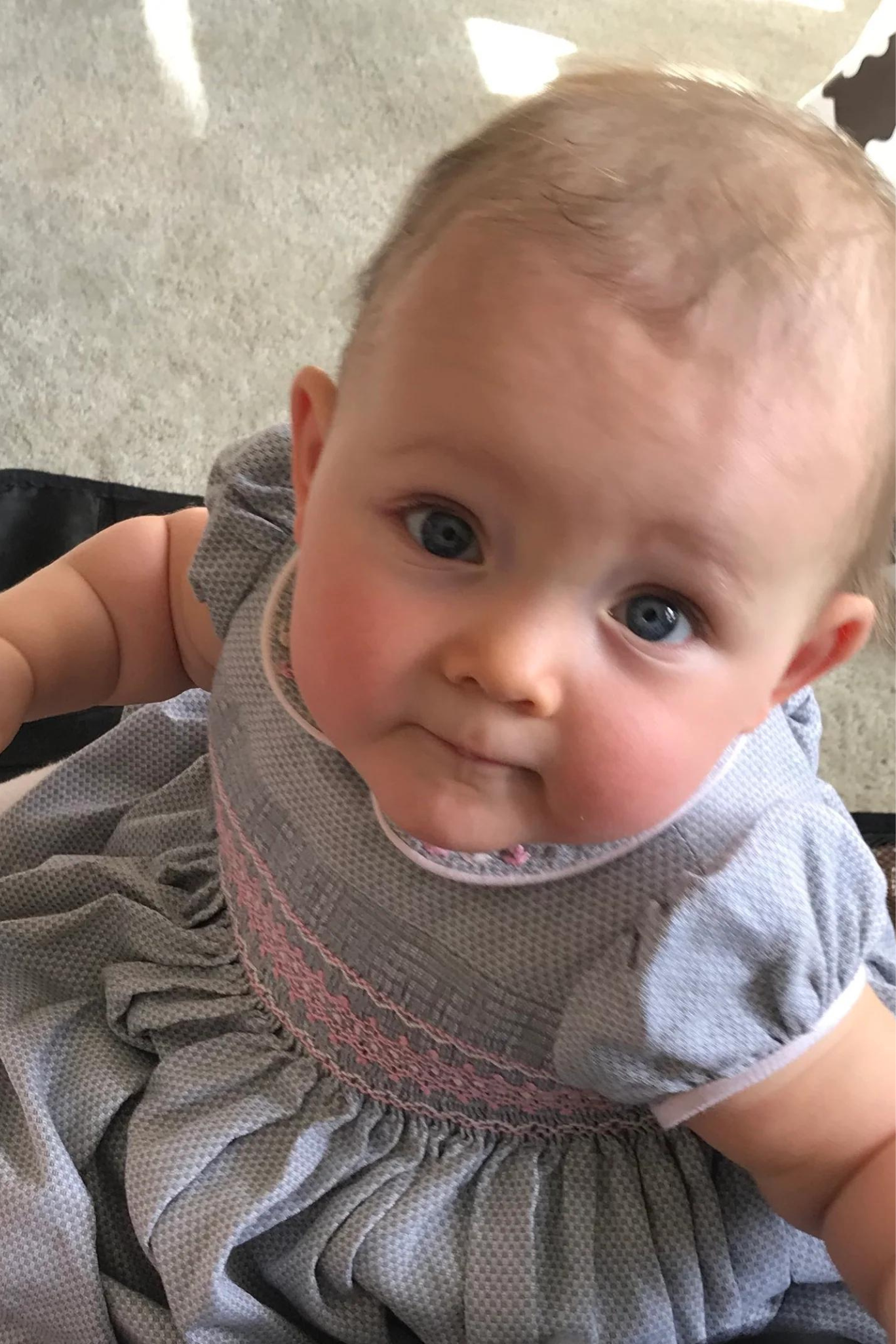 Charlotte sy Dimby classic timeless traditional smocked dresses for babies and girls handmade French style children clothing paris boutique twirling princess dress white heirloom elegant baby girl first dress grey and pink