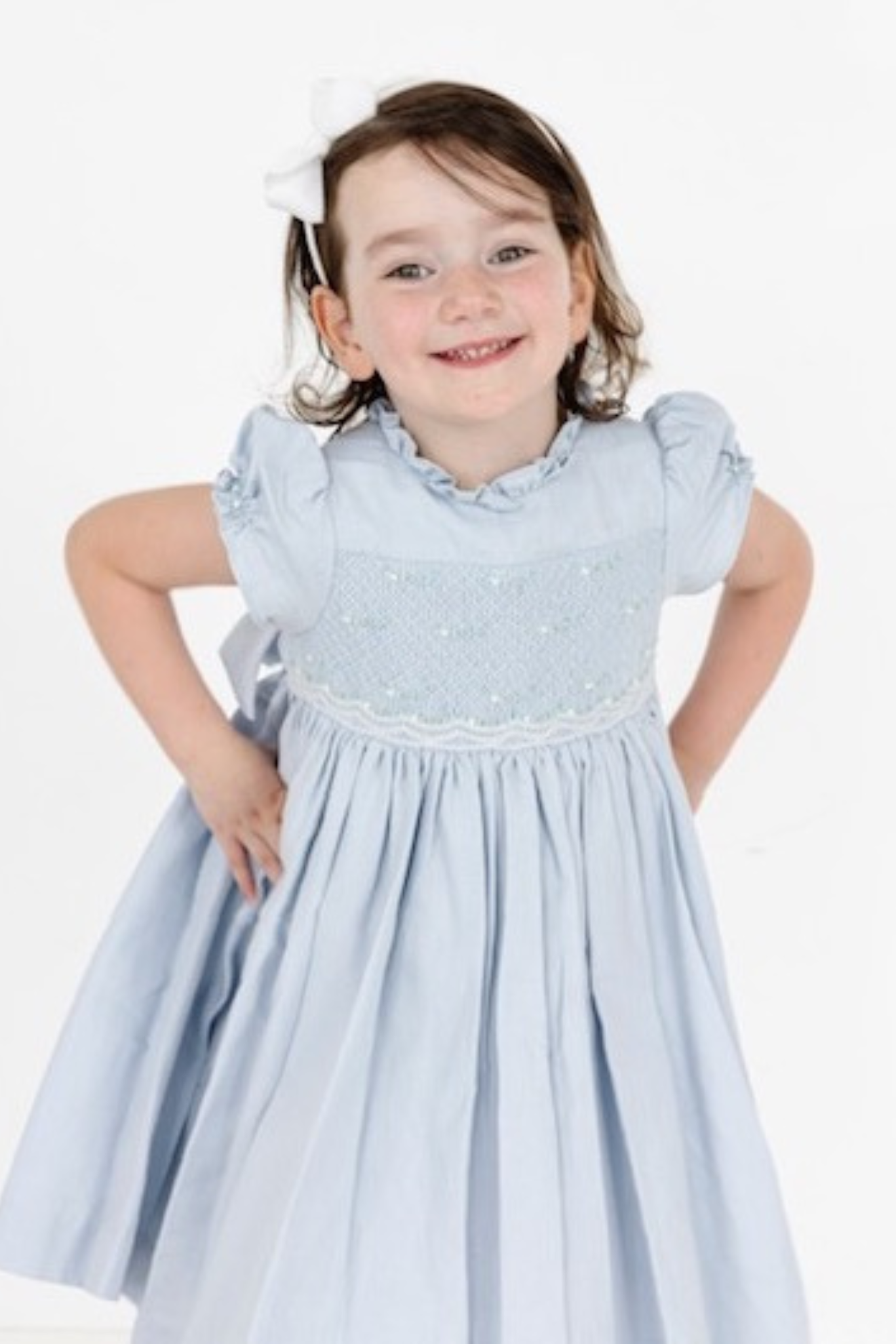Charlotte sy Dimby classic timeless traditional smocked dresses for babies and girls handmade French style children clothing paris boutique texas pastel blue heirloom dress