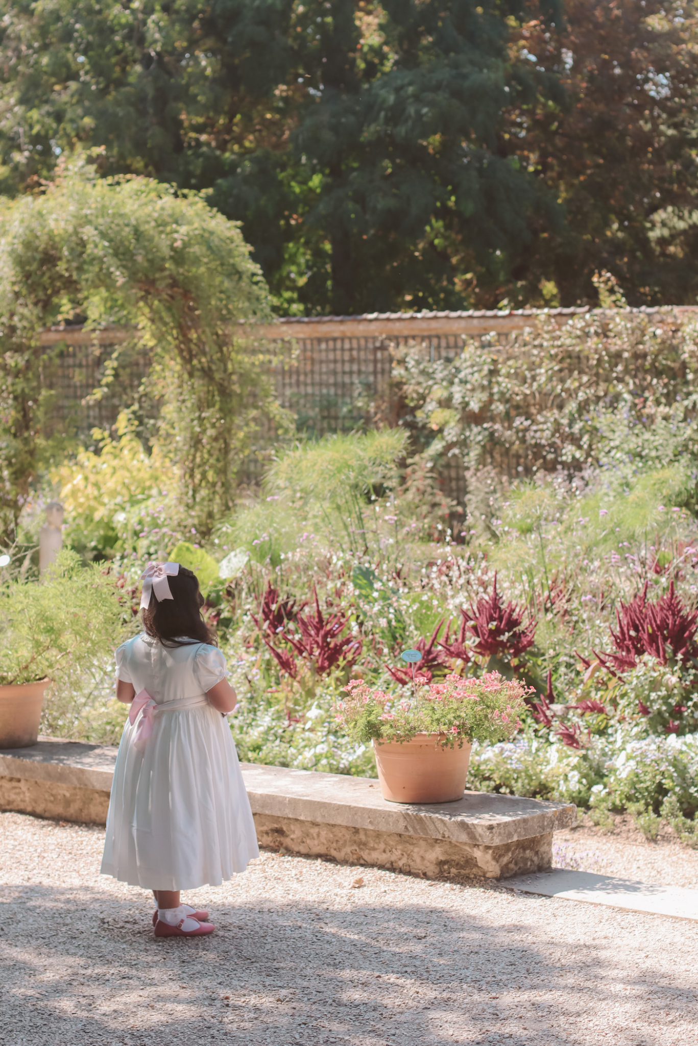 Charlotte sy Dimby classic timeless traditional smocked dresses for babies and girls handmade French style children clothing paris boutique white dress quatar