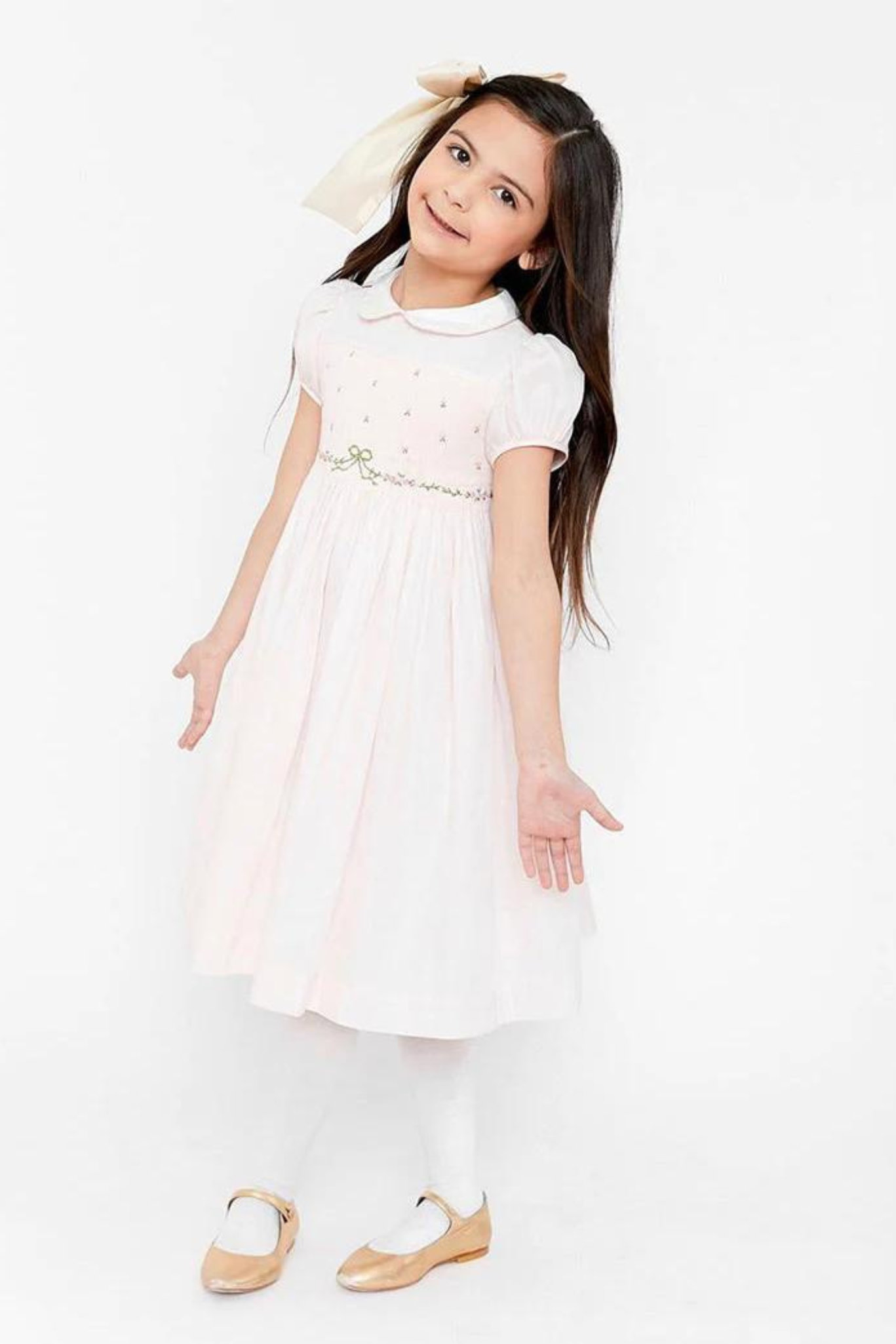 Charlotte sy Dimby classic timeless traditional smocked dresses for babies and girls handmade French style children clothing paris boutique twirling princess dress new york pastel pink bow dress